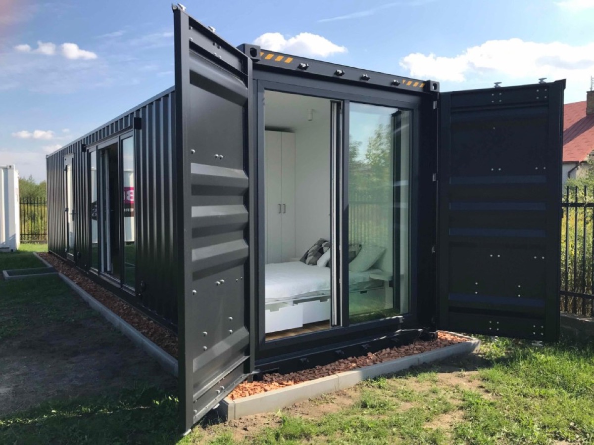 Shipping container conversion with glass doors by Weld4U