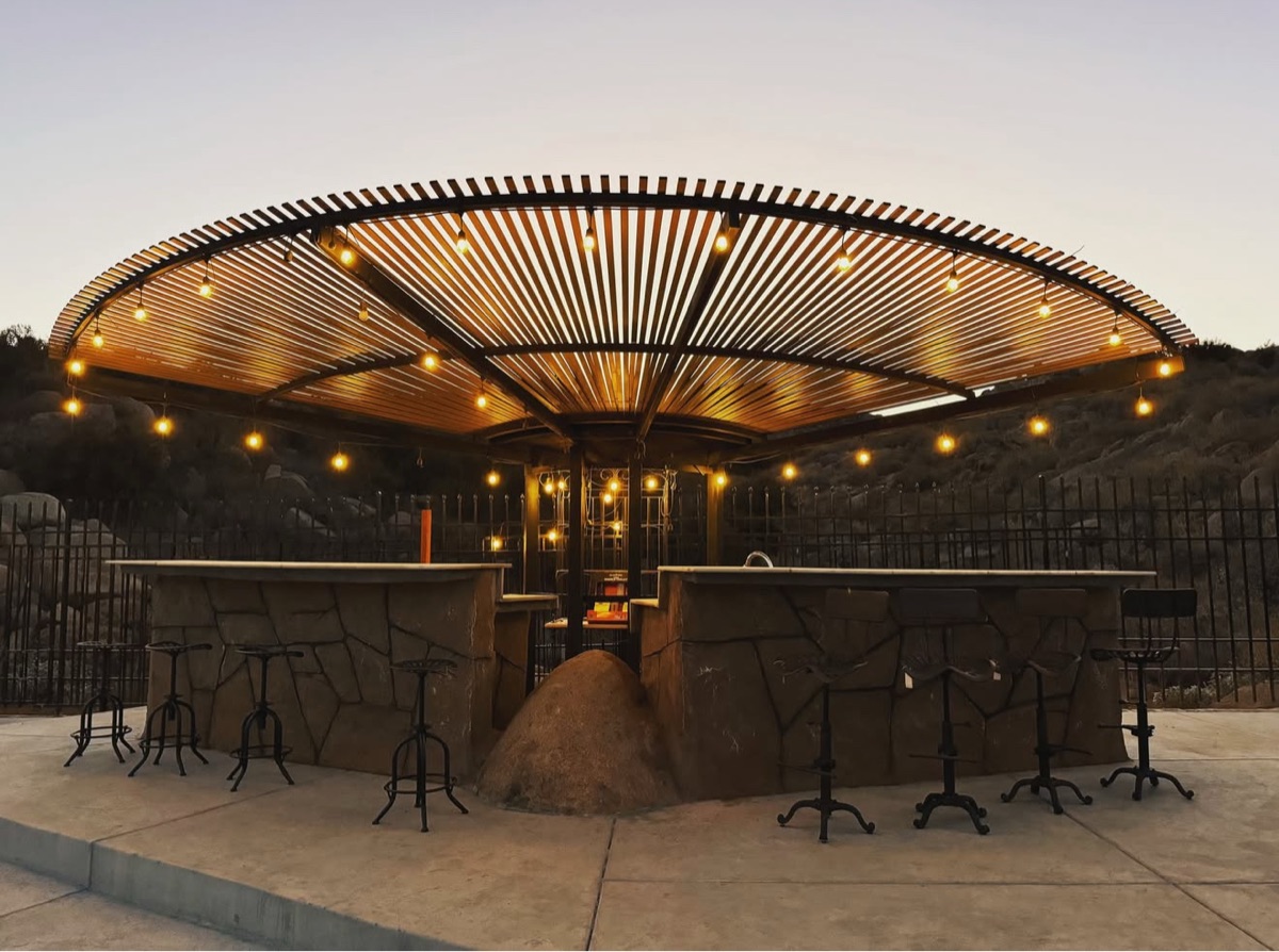 Custom steel shade structure with bar seating fabricated by Weld4U